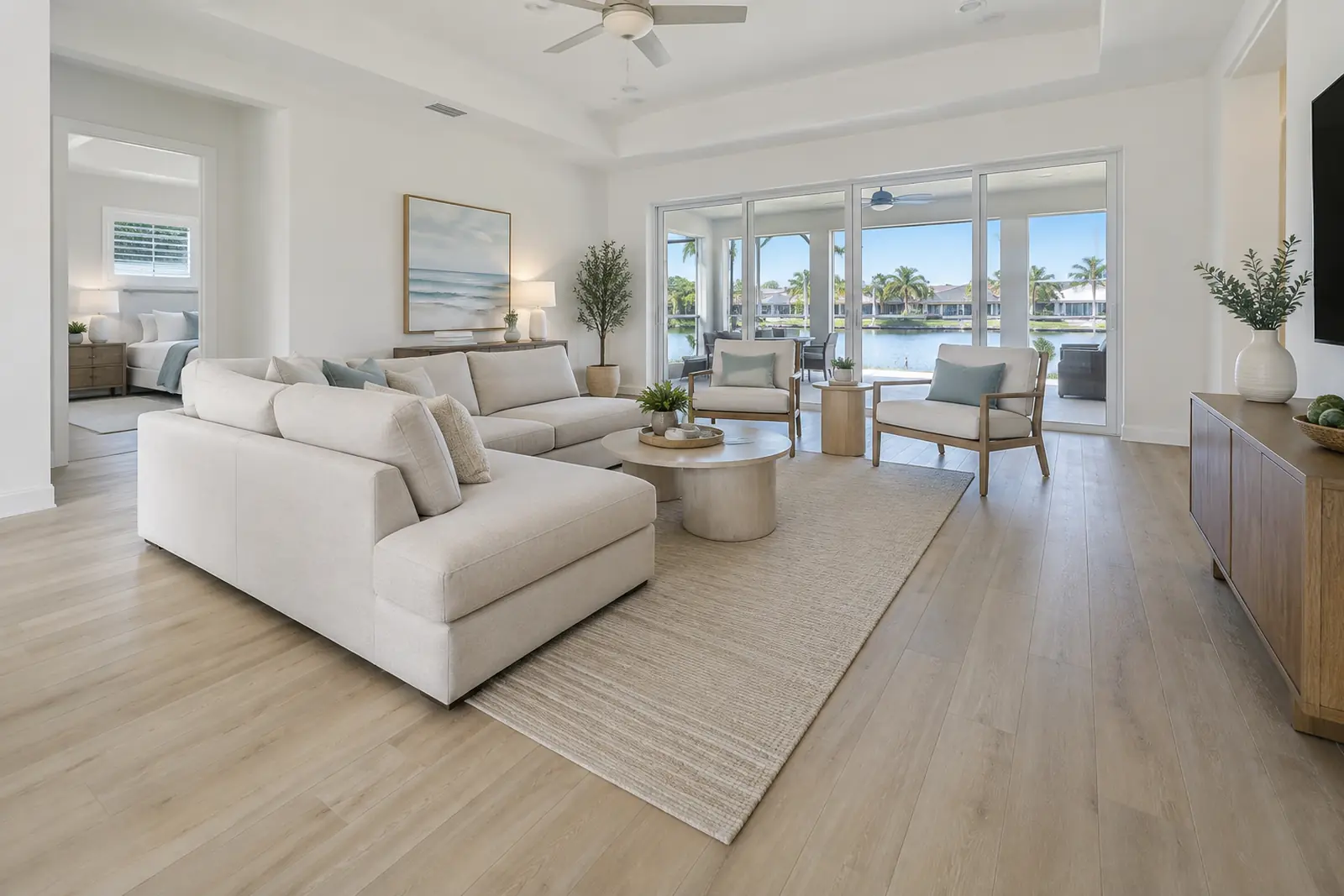 Bright Florida living room with light oak-look luxury vinyl plank flooring